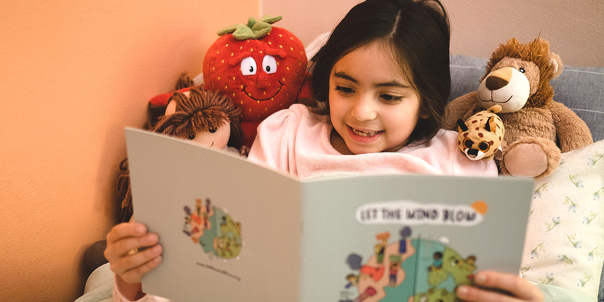 girl reading bedtime story