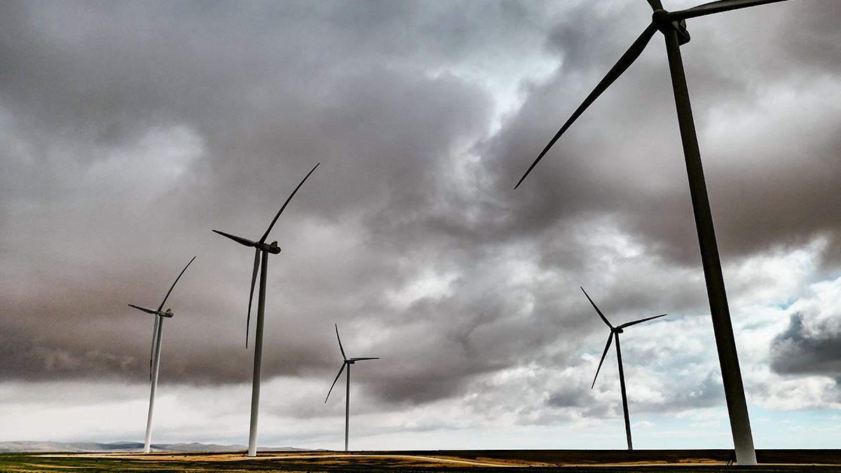 https://windeurope.org/wp-content/uploads/wind-turbines-low-angle-grey-clouds.jpg